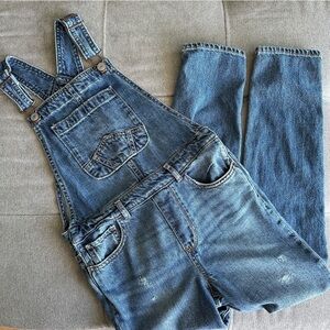 Gap Kids- blue distressed overalls size Medium.